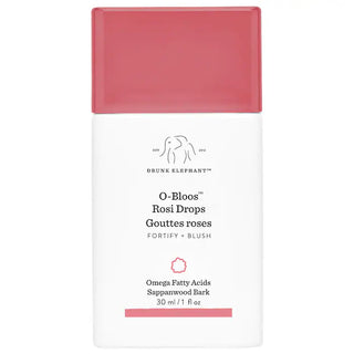 Rubor líquido O-Bloos™ Rosi Glow Drops con Vitamin F- Drunk Elephant vista frontal con fondo blanco.
