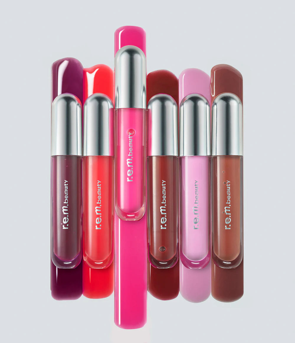 Bálsamo Labial Glossy balm - R.E.M. Beauty vista frontal con fondo blanco.