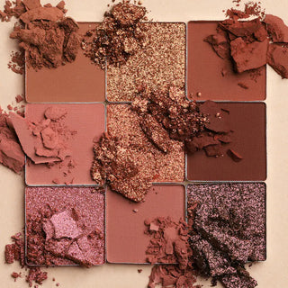 Paleta de Sombras de Ojos Nude Obsessions - Huda Beauty vista frontal con fondo blanco.