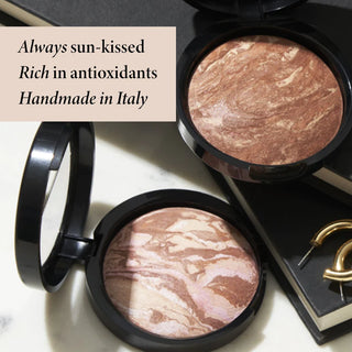 Bronzer Baked Bronze-n-Brighten Multipurpose - Laura Geller vista frontal con fondo blanco.