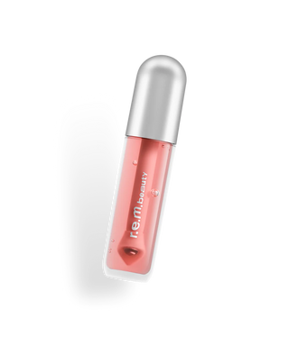 Lip Oil - R.E.M. Beauty vista frontal con fondo blanco.