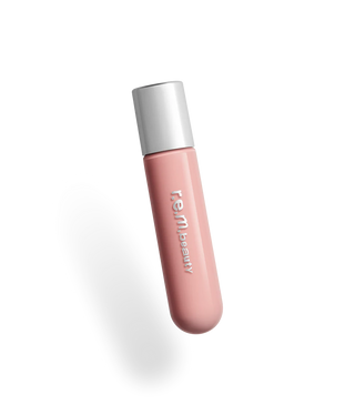 Labial Gloss voluminizador Plumping lip gloss - R.E.M. Beauty vista frontal con fondo blanco.