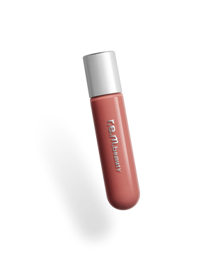 Labial Gloss voluminizador Plumping lip gloss - R.E.M. Beauty vista frontal con fondo blanco.