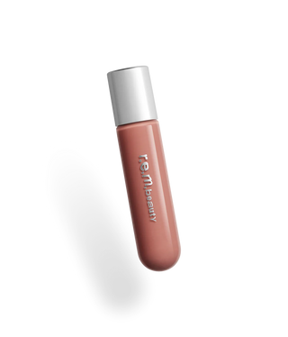 Labial Gloss voluminizador Plumping lip gloss - R.E.M. Beauty vista frontal con fondo blanco.