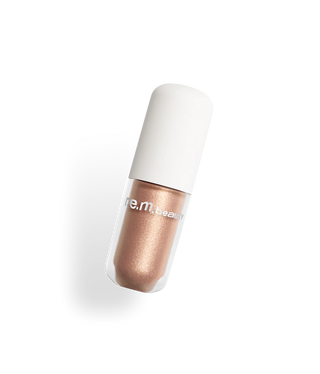 Sombra de Ojos Lustrous liquid eyeshadow - R.E.M. Beauty vista frontal con fondo blanco.