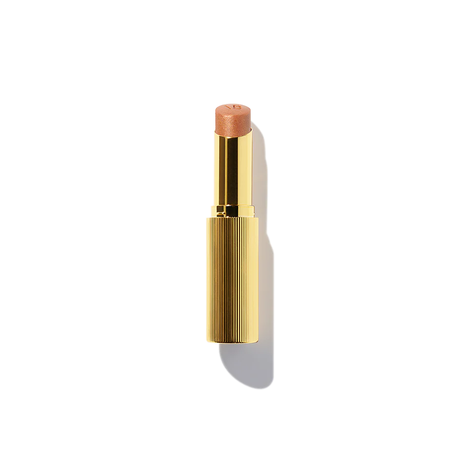 Iluminador en Barra Reflect Highlighter Stick™ - Victoria Beckham beauty vista frontal con fondo blanco.