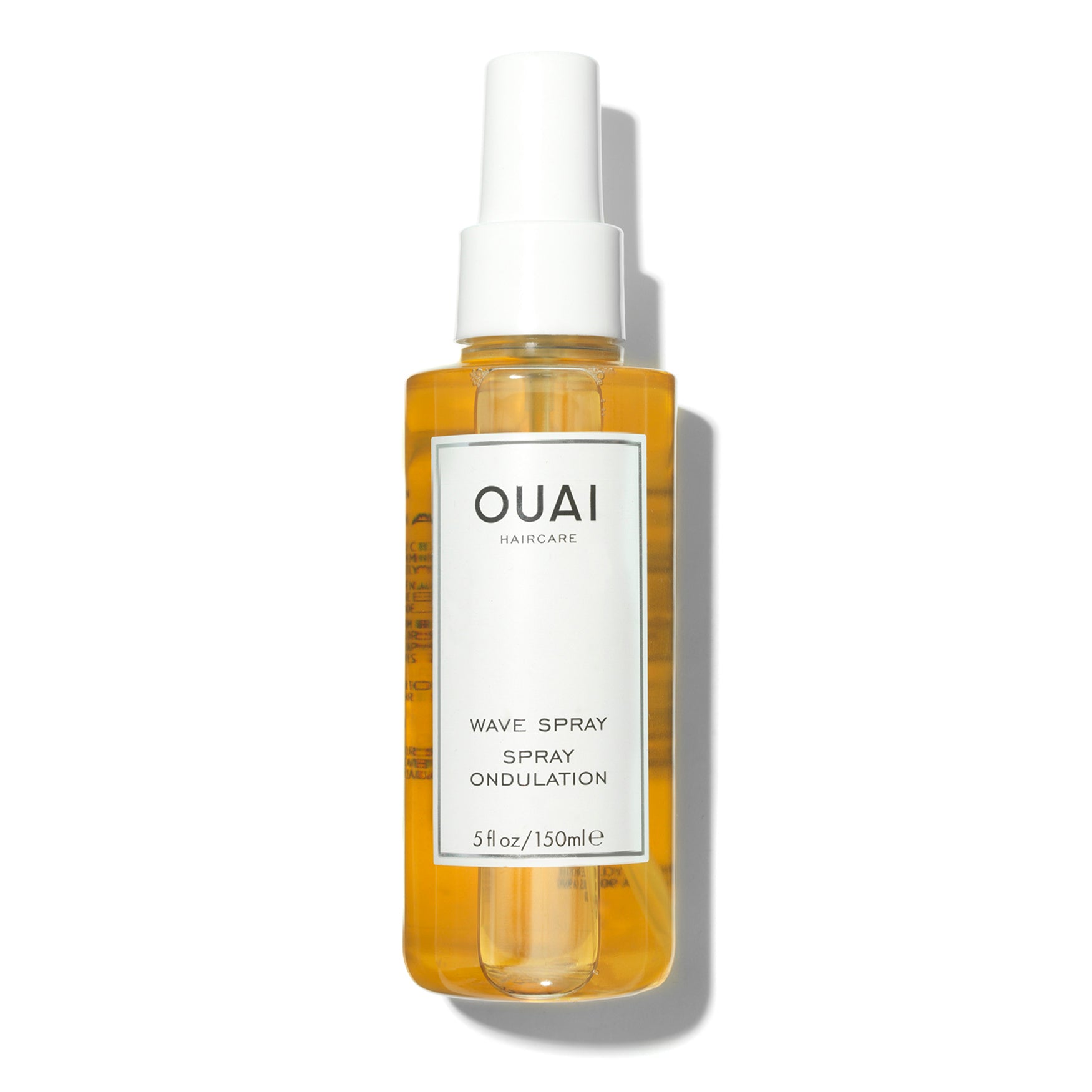 Spray ondulador de Cabello Wave Spray™ - OUAI vista frontal con fondo blanco.