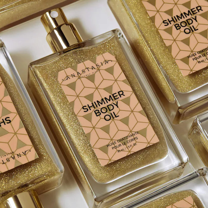 Shimmer Body Oil - Anastasia Beverly Hills vista frontal con fondo blanco.