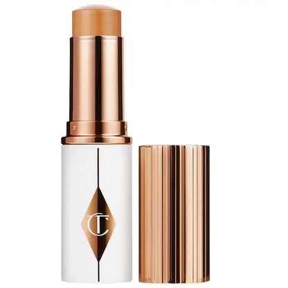 Base de Maquillaje en Barra Unreal Skin Sheer Glow Tint Hydrating - Charlotte Tilbury vista frontal con fondo blanco.