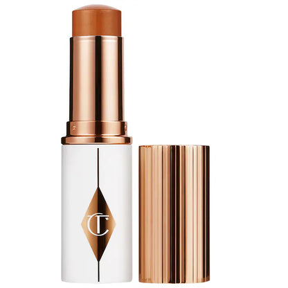 Base de Maquillaje en Barra Unreal Skin Sheer Glow Tint Hydrating - Charlotte Tilbury vista frontal con fondo blanco.