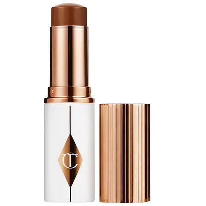 Base de Maquillaje en Barra Unreal Skin Sheer Glow Tint Hydrating - Charlotte Tilbury vista frontal con fondo blanco.