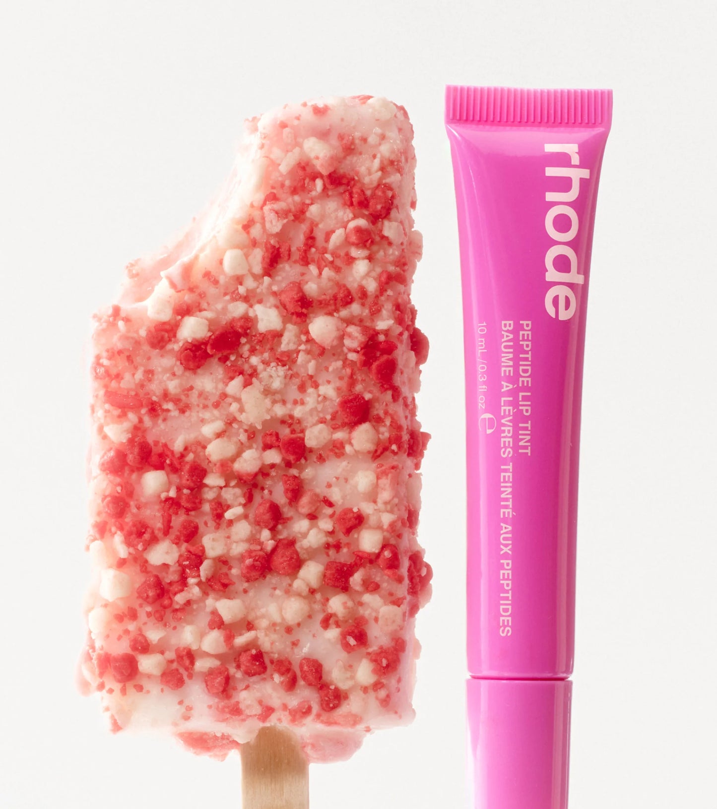 Tinte labial Peptide lip tint THE TINTED LIP LAYER - Rhode Skin vista frontal con fondo blanco.